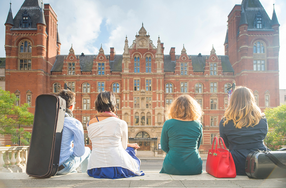 Students sit in front of the RCM